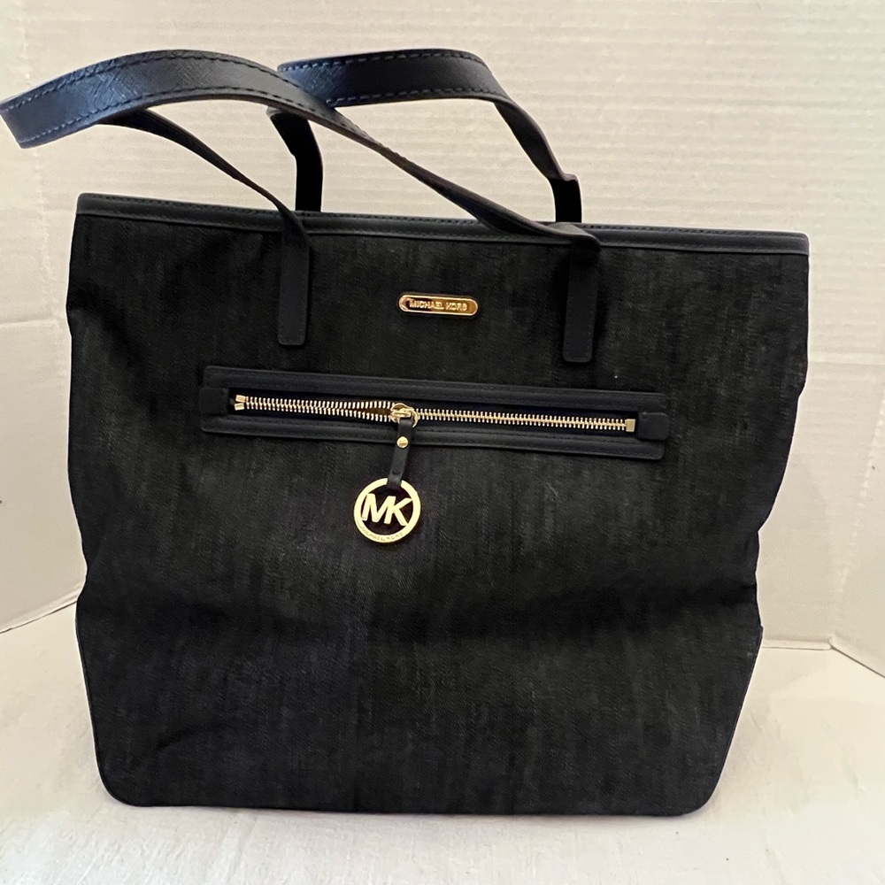 Michael Kors denim tote style handbag.
